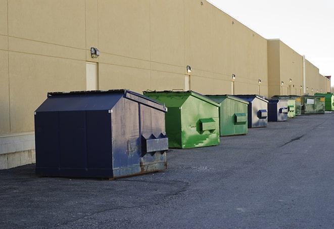 well-organized construction site with dumpsters in place in Amherst